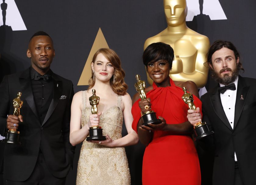 89th Academy Awards - Oscars Backstage - Hollywood, California, U.S. - 26/02/17 – Best Supporting Actor Mahershala Ali, for Moonlight, Best Actress Emma Stone for La La Land, Best Supporting Actress Viola Davis, for Fences and Best Actor Casey Affleck for Manchester by the Sea (L-R), hold their Oscars. REUTERS/Lucas Jackson